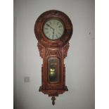 A large tavern style walnut cased regulator clock