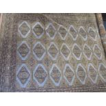 A Pakistan hand made wool rug, approx size 5ft x 8ft