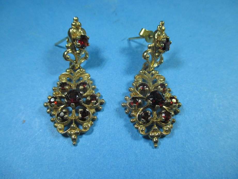 A pair of 9ct gold and garnet earrings, approx weight 8g