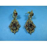 A pair of 9ct gold and garnet earrings, approx weight 8g