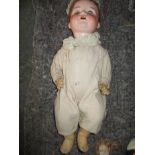 A vintage Armand Marseille doll. Register and bid at https://clareauction.com/a