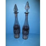 A pair of bohemian amethyst glass decanters. Register and bid at https://clareau