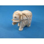 A 19th century carved ivory Netsuke, signed to under side