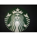 An illuminated Starbucks coffee sign