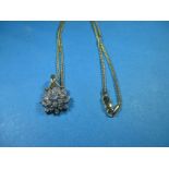 A 14ct gold necklace with a diamond set pendant