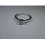 A 9ct white gold square cut diamond solitaire ring, approx ring size N