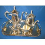 A silver plated tea set on tray