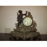 An early 20th century continental gilt brass mantle clock