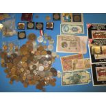 A quantity of mixed coins, bank notes and medallions
