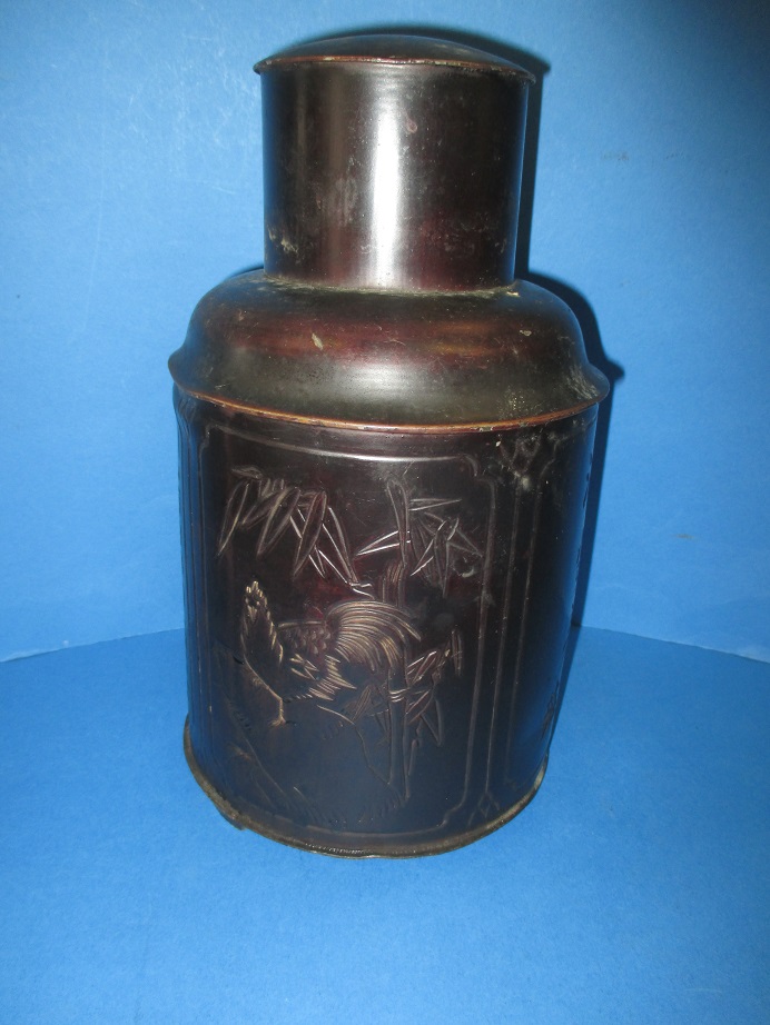 An oriental bronzed pewter tea canister, marked to base