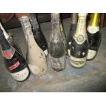 9 bottles of vintage champagne and sparkling wine. Register and bid at https://c