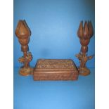 A pair of Indian carved wood opening flowers and a carved wood trinket box