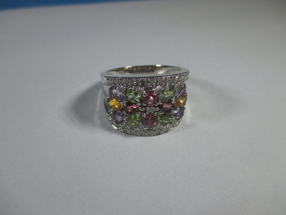 A 9ct white gold 'Rainbow' ring set with multipul coloured stones, approx ring s