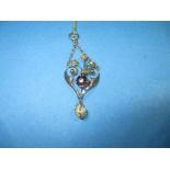 An Edwardian 9ct gold necklace pendant with a baroque pearl drop