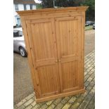 A pine double wardrobe