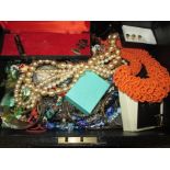 A box of vintage costume jewellery