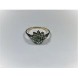A 9ct gold diamond and emerald ring, approx ring size P