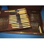 A vintage wood cased 12 place setting canteen of cutlery