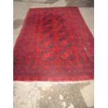 An antique middle eastern wool rug