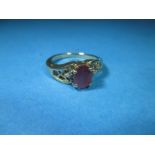 A 9ct gold and ruby ring, approx size K