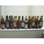24 Bottles of cellar stored white wine, dating 1998. Register and bid at https:/