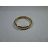 A 22ct gold wedding band, approx weight 3.3g