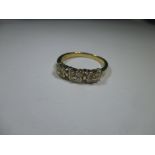 An 18ct gold 12 stone diamond ring