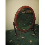 A 19th century mahogany toilet mirror