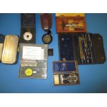 A quantity of vintage cased instruments