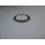 A platinum and diamond eternity ring, approx finger size L