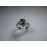 A platinum ruby diamond cocktail ring, approx finger size N