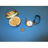 A 9ct gold charm, Kigu compact and a pocket watch