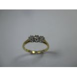 An 18ct gold 3 stone diamond ring, approx finger size H1/2