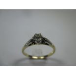 An antique 18ct gold and platinum diamond solitaire ring, approx finger size O