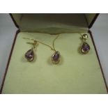 A 9ct gold necklace and earring set