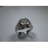 An 18ct white gold ring with central diamond and ruby to shoulders, one deficient, approx finger