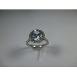 A platinum diamond and aquamarine Tiffany Soleste style ring, approx finger size M