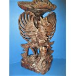 An Indonesian carved wood garuda