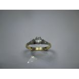 An 18ct gold diamond solitaire ring, approx finger size O