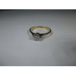 An 18ct yellow gold diamond solitaire ring, approx. ring size M