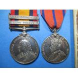 A Queens South Africa medal and a 1911 Metropolitan police medal to 40231 PTE H.A. Westley32nd BN: