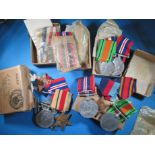 4 sets of WWII medals in original boxes and paperwork