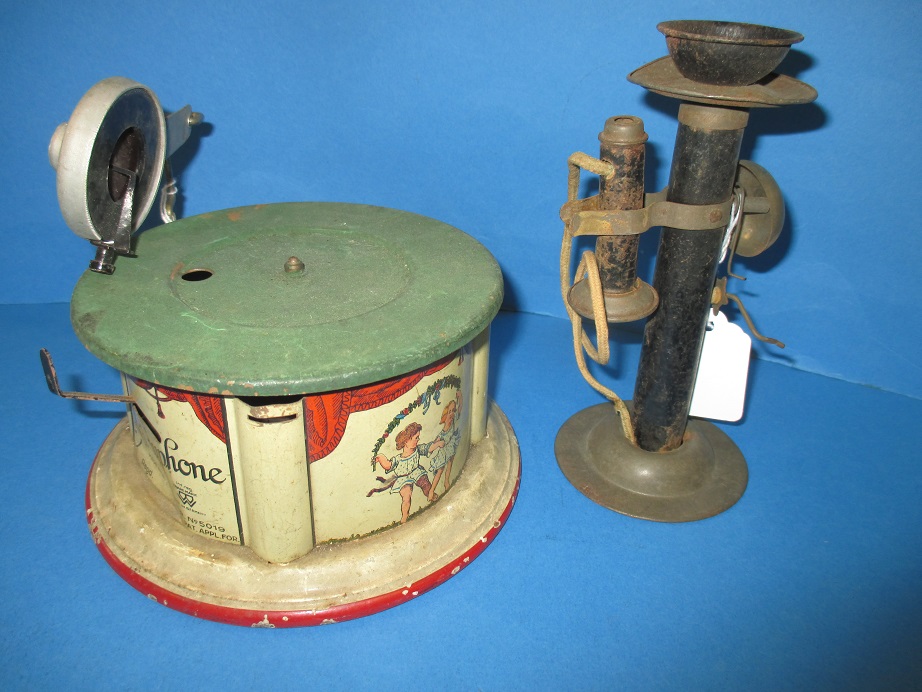 A German Bing tin plate clockwork 'Kiddyphone' toy record player and a tin plate toy telephone