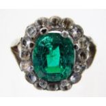 A 19thC. 9ct gold ring set with green & white ston