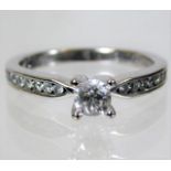 An 18ct white gold ring set with 0.33ct centre sto