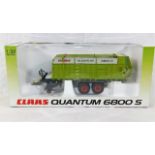 A boxed diecast model of a Claas Quantum 6800S