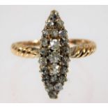 A 14ct gold marquise shaped ring set with diamonds