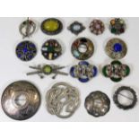 A quantity of Celtic & similar brooches