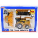 A boxed diecast model Ertl FX60 forage harvester