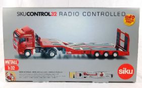 A boxed Siku 1:32 scale radio controlled diecast t